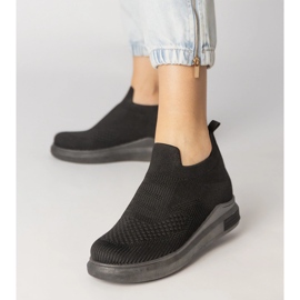 Svarta sockens sneakers infogade 5