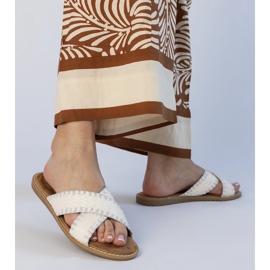 Vita kvinnors tofflor 1