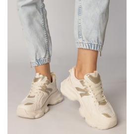 Beige sneakers kvinnors sport med en gyllene införande 4