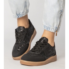 Svarta kvinnors sneakers dekorerade med glitter 5
