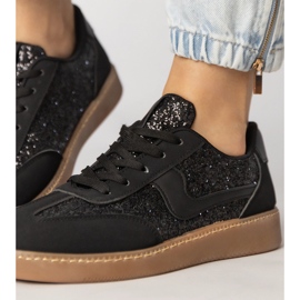 Svarta kvinnors sneakers dekorerade med glitter 6