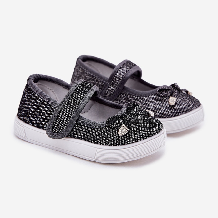 Barns ballerinor med en svart båge 1