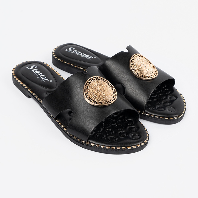 Seastar Svarta flip flops med en gyllene dekoration 1