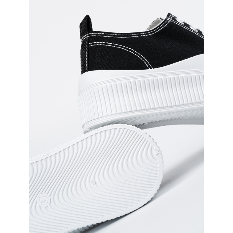 Svarta och vita sneakers med tjock sula 1