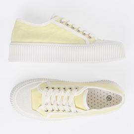 Shelvt Gula snörda sneakers på en tjock sula 4