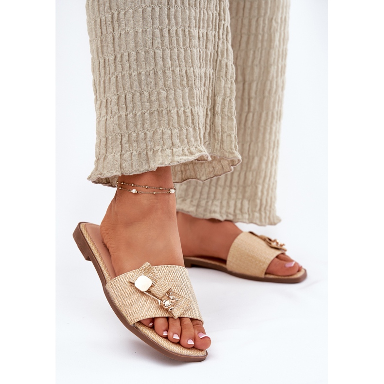 Inna Flat -hanterade kvinnors flip flops med en båge -beige 2