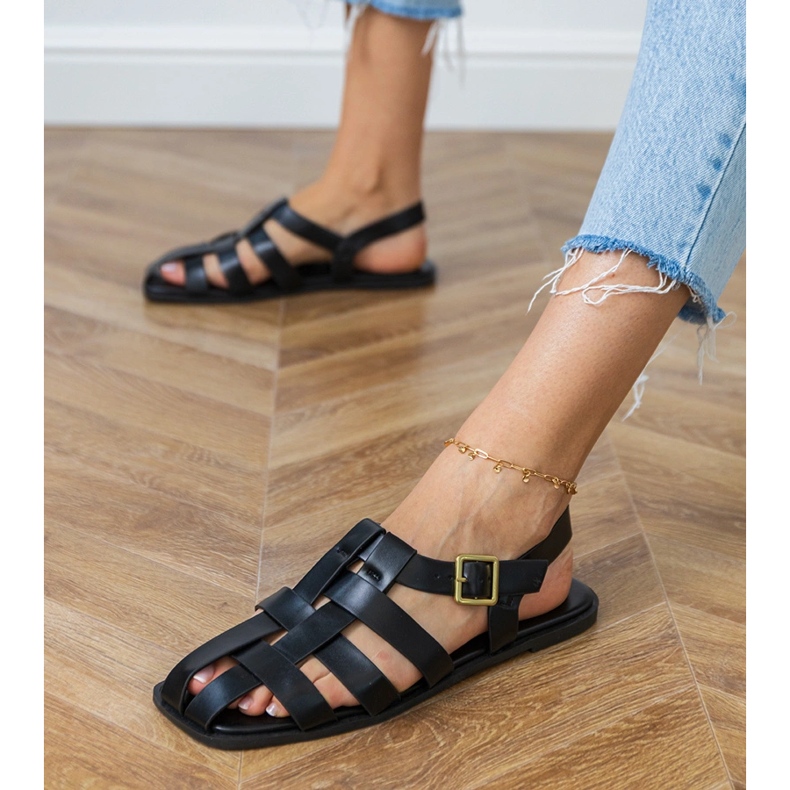 Svarta sandaler gladiator byggda 2