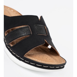 Kvinnors svarta flip -flops 4