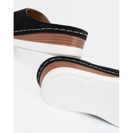 Kvinnors svarta flip -flops 5