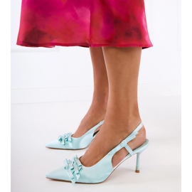 Gröna pumpar på en stift med bågar 2