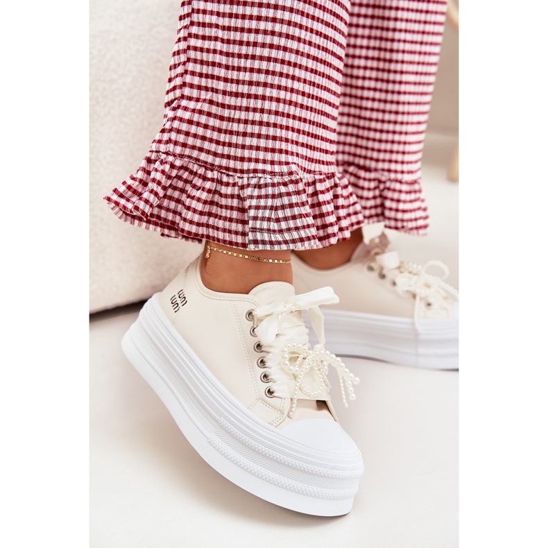 Kvinnors sneakers på plattformen med dekorativ snörning beige 2