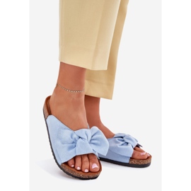 Kvinnors flip flops på korksulan med en blå båge 1