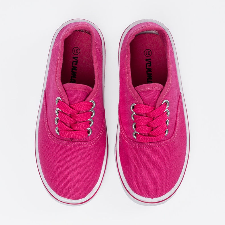 Rosa barns sneakers med en vit sula 1