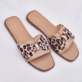 Flat -hanterade kvinnors flip flops med en båge -beige 10