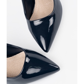 Marinblå plockade pumpar på en hög häl 1