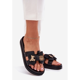 Kvinnors tofflor med en båge och en gyllene brosch svart 1