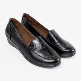 Kvinnor med en orms hudstruktur svart 2