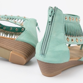Shelvt Turkosa sandaler med boho -studs 1