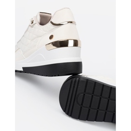 Shelvt Beige sneakers med skimrande gyllene accenter 1