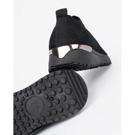 Shelvt Svart slip-on sportskor med en mesh övre delen 1