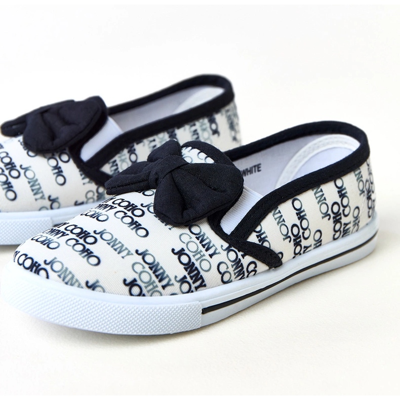 Vita barns sneakers med en Missi -båge 1