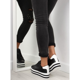 Svarta svarta sneakers med hög sula 1