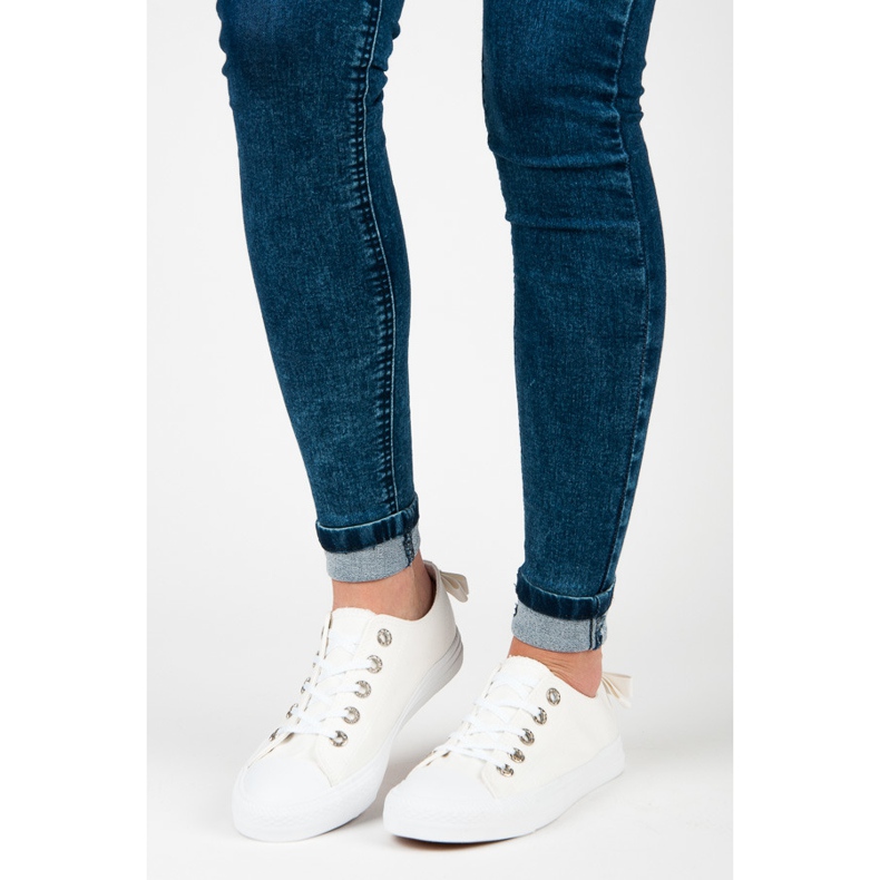 Vita sneakers med rosett 1