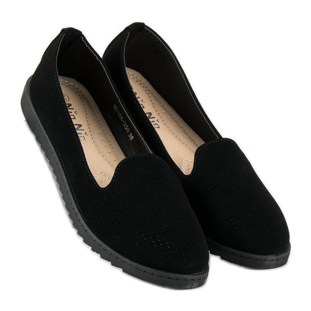 Nio Nio Svarta genombrutna herrar 1