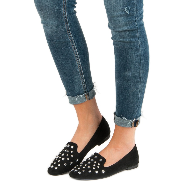 Svarta herrar med prydnader 1