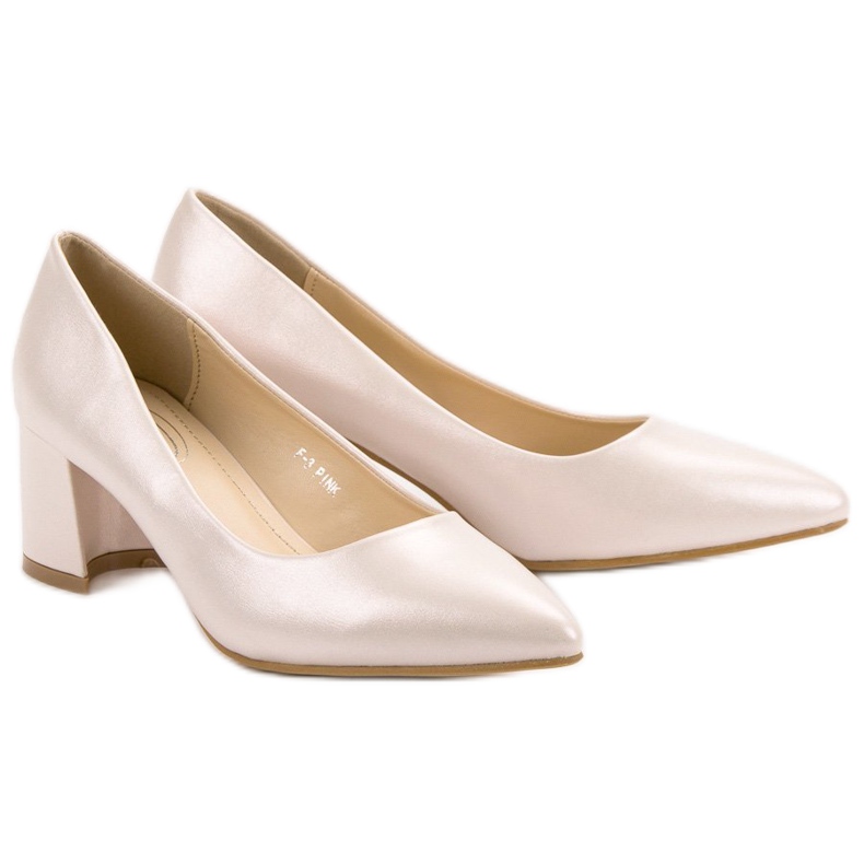 Pumpar På En Pelare brun rosa 1