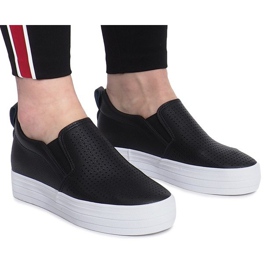 Svarta openwork -sneakers på en Rockvale -kil 2