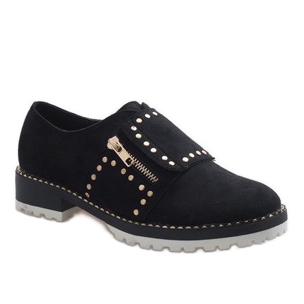 Svarta slip-on skor med U-6249 dubbar 1