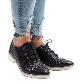 Svarta genomskinliga skor med G-106-2 dubbar 1