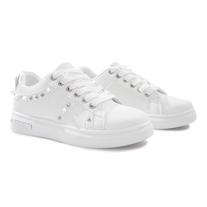 Vita sneakers med Lucette dubbar 1