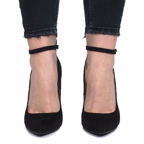 Svarta pumpar på en himmelklack 1