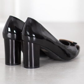 Sergio Leone Eleganta pumpar på en pelare svart 1