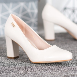 Sergio Leone Bekväma pumpar på en pelare brun 1