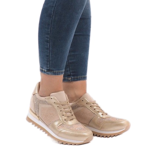 Gyllene sneakers på kilen G-125 1