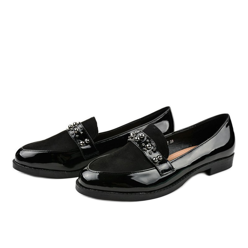 Svarta slip-on skor med JN-27 dubbar 2