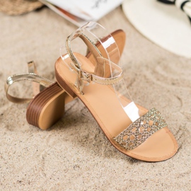 Small Swan Eleganta flätade sandaler gyllene 1