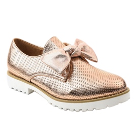 Gyllene slip-on skor med en RS-WED2 rosett 1