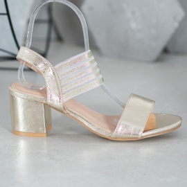 Small Swan Glänsande slip -on sandaler gyllene 2