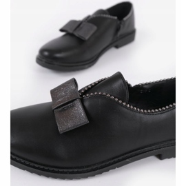BM Svarta slip-on skor med rosett 239-2 1
