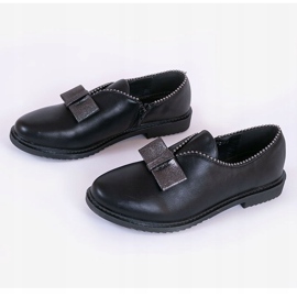 BM Svarta slip-on skor med rosett 239-2 2