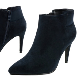 Marinblå fotbollsskor med en Adressea -resår 1