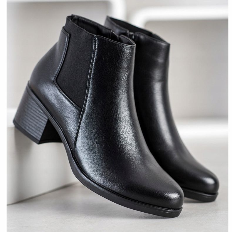 J. Star Stövlar på ett inlägg svart 1