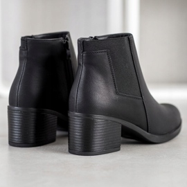 J. Star Stövlar på ett inlägg svart 1