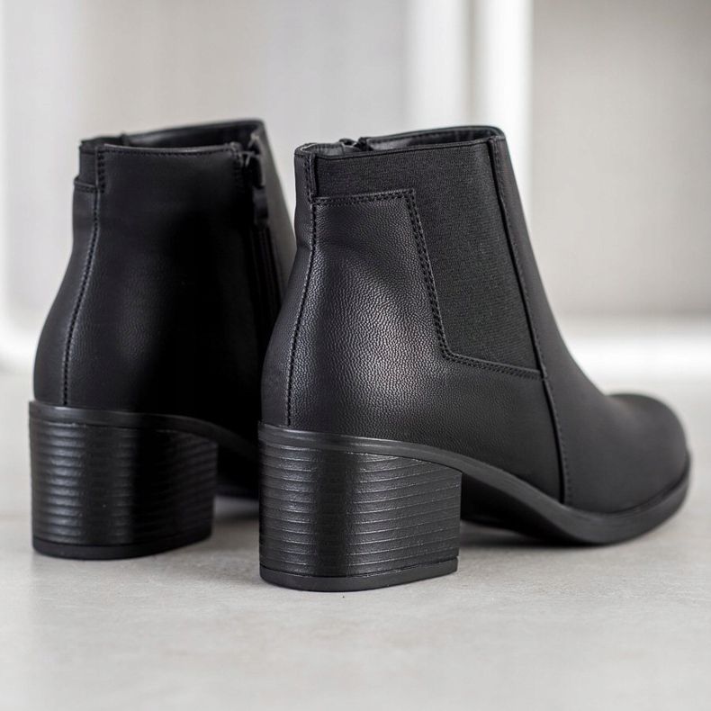 J. Star Stövlar på ett inlägg svart 1