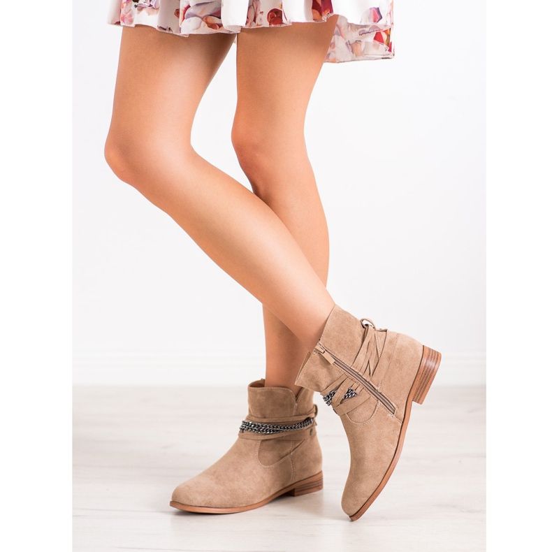 Cm Paris Cowgirls med en dekorativ kedja beige 1