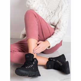 Kylie Svarta fällare med fårskinn 1